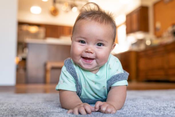 Cute baby on carpet | Cabinet Factory Of Virginia